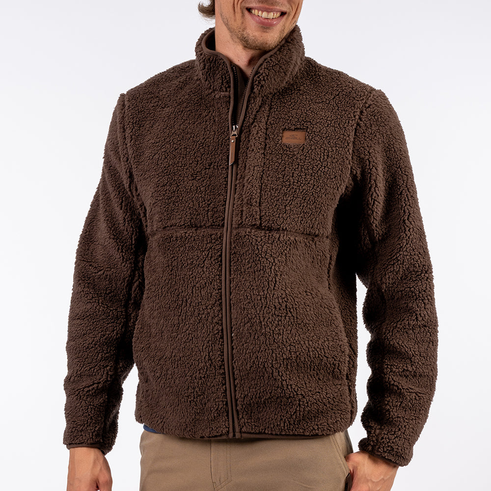 Man wearing a brown fleece jacket on a white background