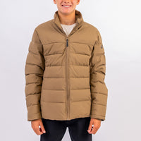 Person wearing a brown puffer jacket on a white background