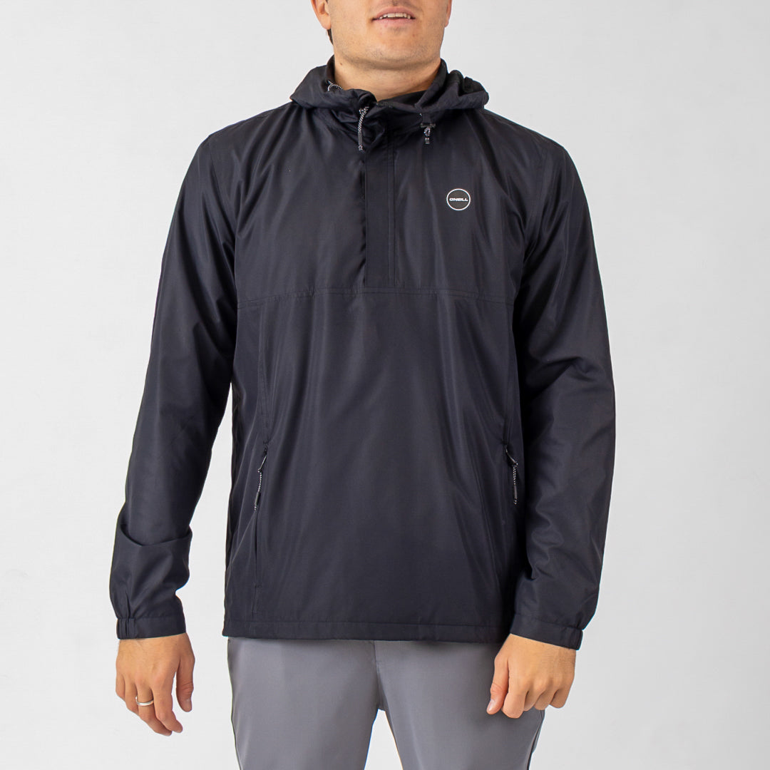 Person wearing a black jacket with a brand logo on a light gray background