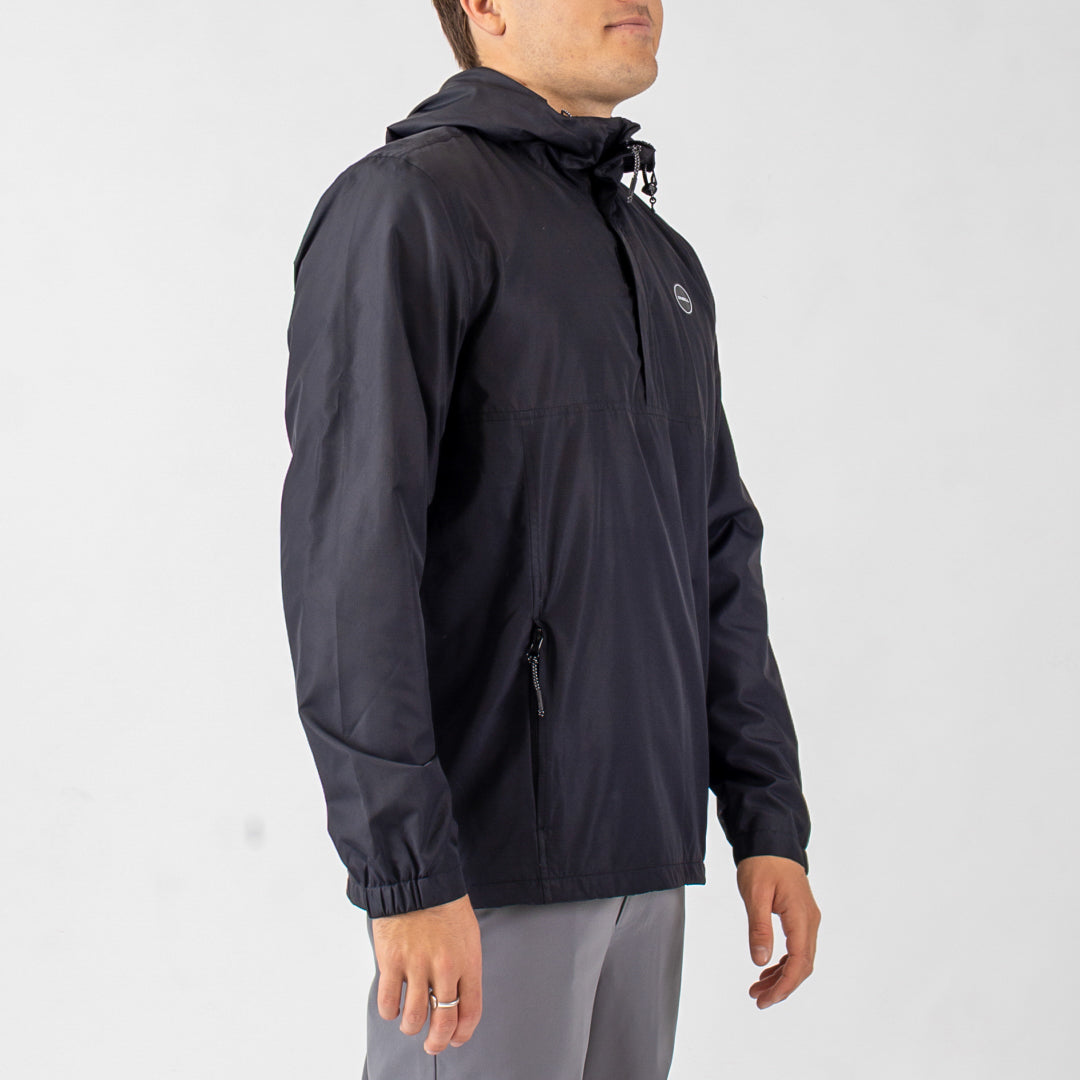 Person wearing a black jacket on a white background