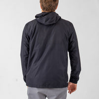 Person wearing a black jacket on a white background
