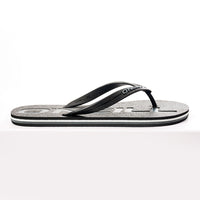 Black and gray sandal on a white background