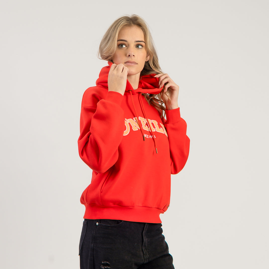 Person wearing a red hoodie with text on a plain background