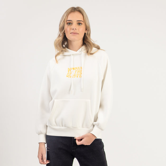 Person wearing a white hoodie with yellow text on a plain background