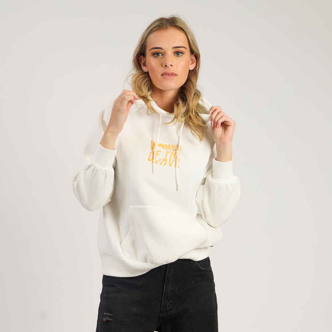 Woman wearing a white hoodie with text on a plain background