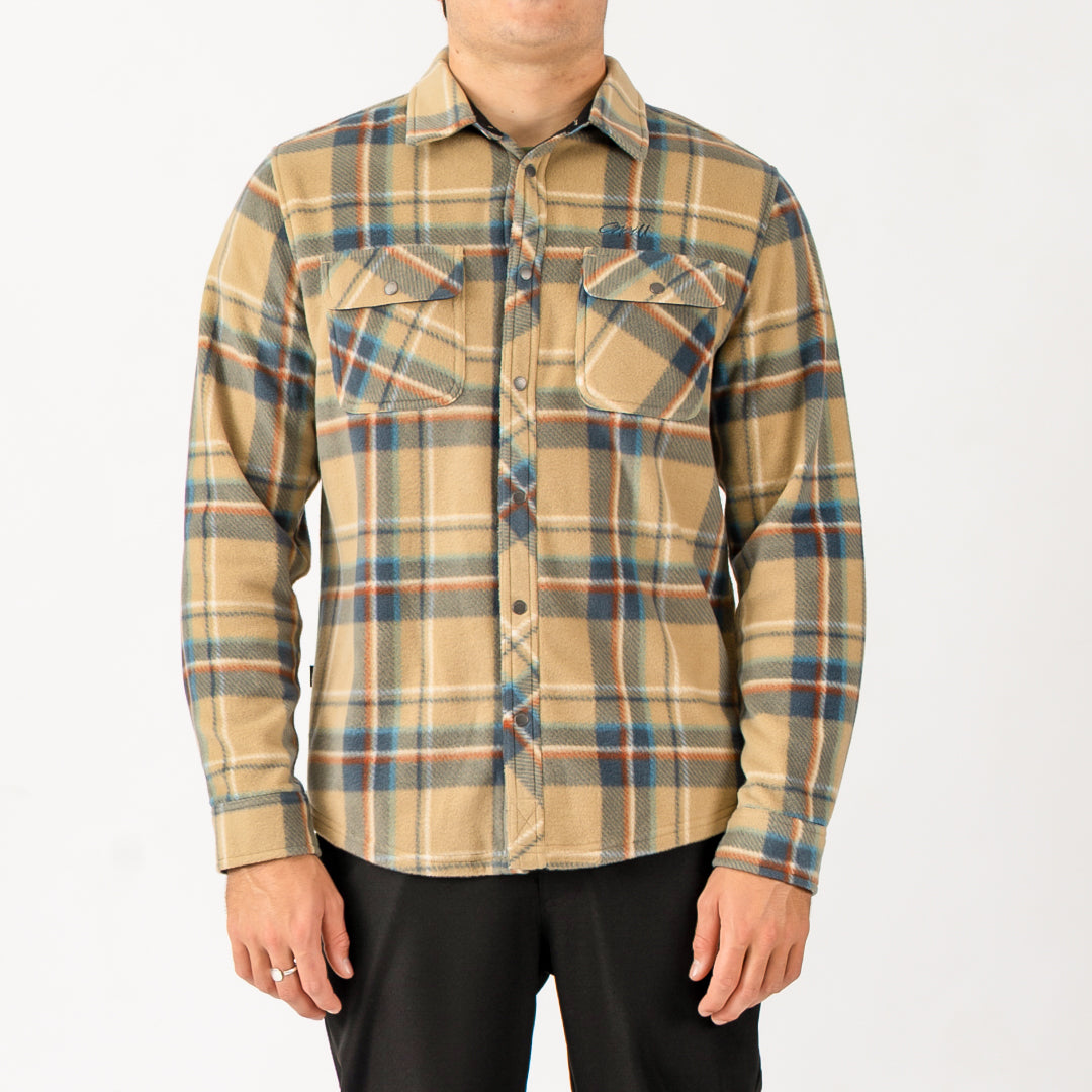 Plaid shirt worn by a person on a white background