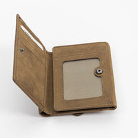 Brown leather wallet with a card holder on a white background
