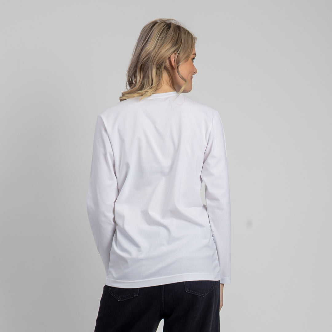 Person wearing a white sweatshirt with a plain background