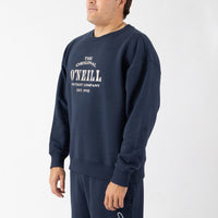 Person wearing a navy blue sweatshirt with 'The Original O'Neill' logo on a white background