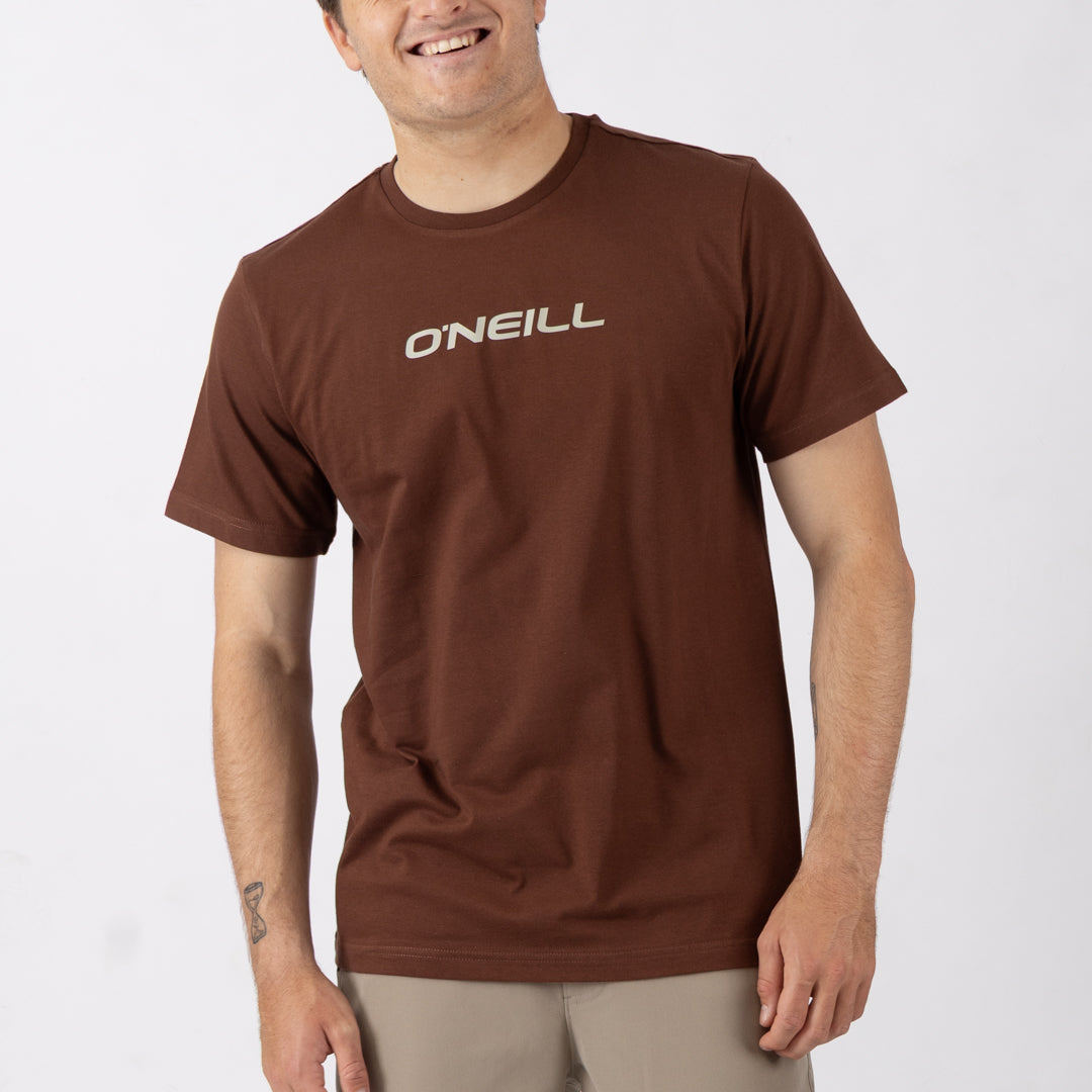 Man wearing a brown O'Neill t-shirt on a white background
