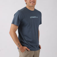Man wearing a navy blue O'Neill t-shirt on a light gray background