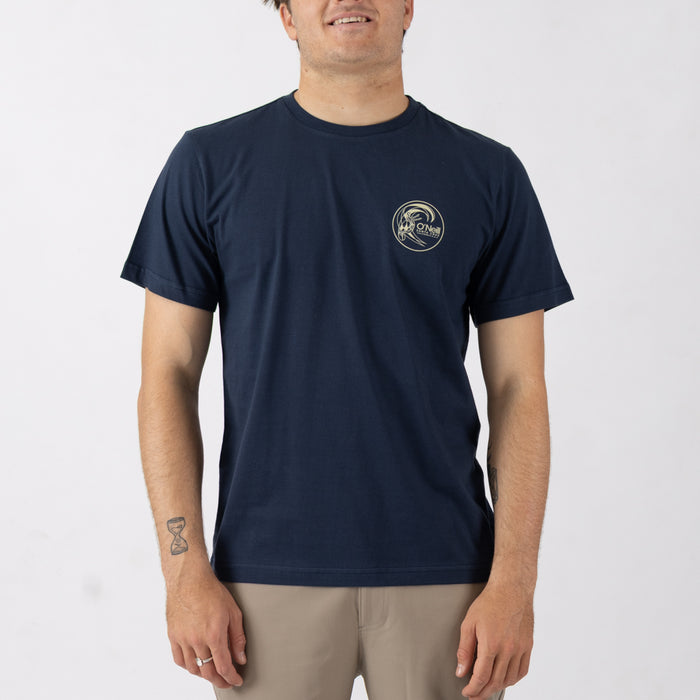 Man wearing a navy blue t-shirt with a logo on a white background