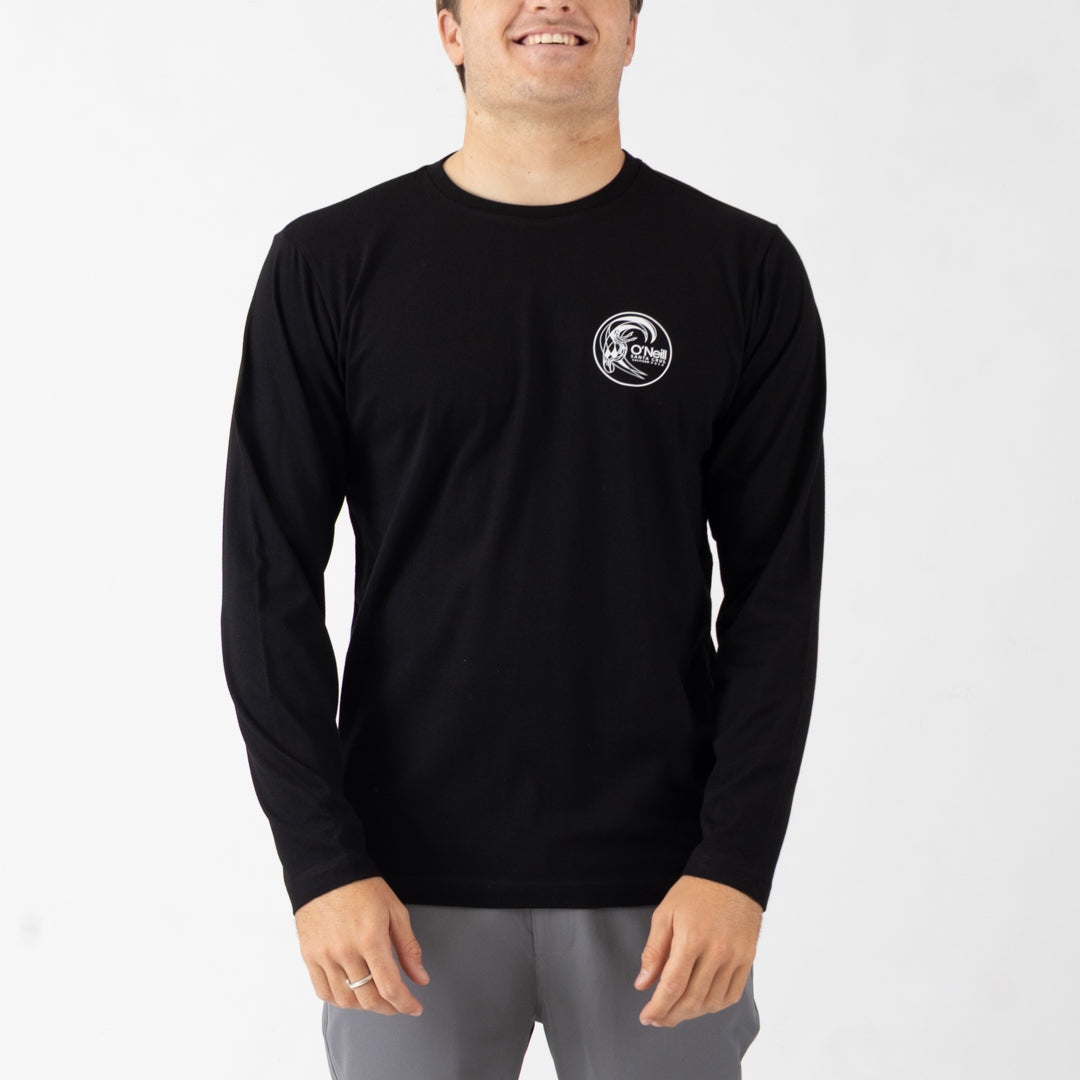 Person wearing a black long-sleeve shirt with a logo on a white background