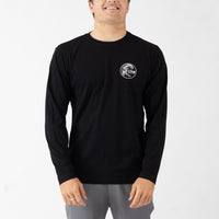Person wearing a black long-sleeve shirt with a logo on a white background