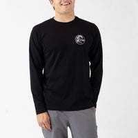 Person wearing a black long-sleeve shirt with a logo on a white background