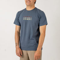 Man wearing a blue O'Neill t-shirt on a white background