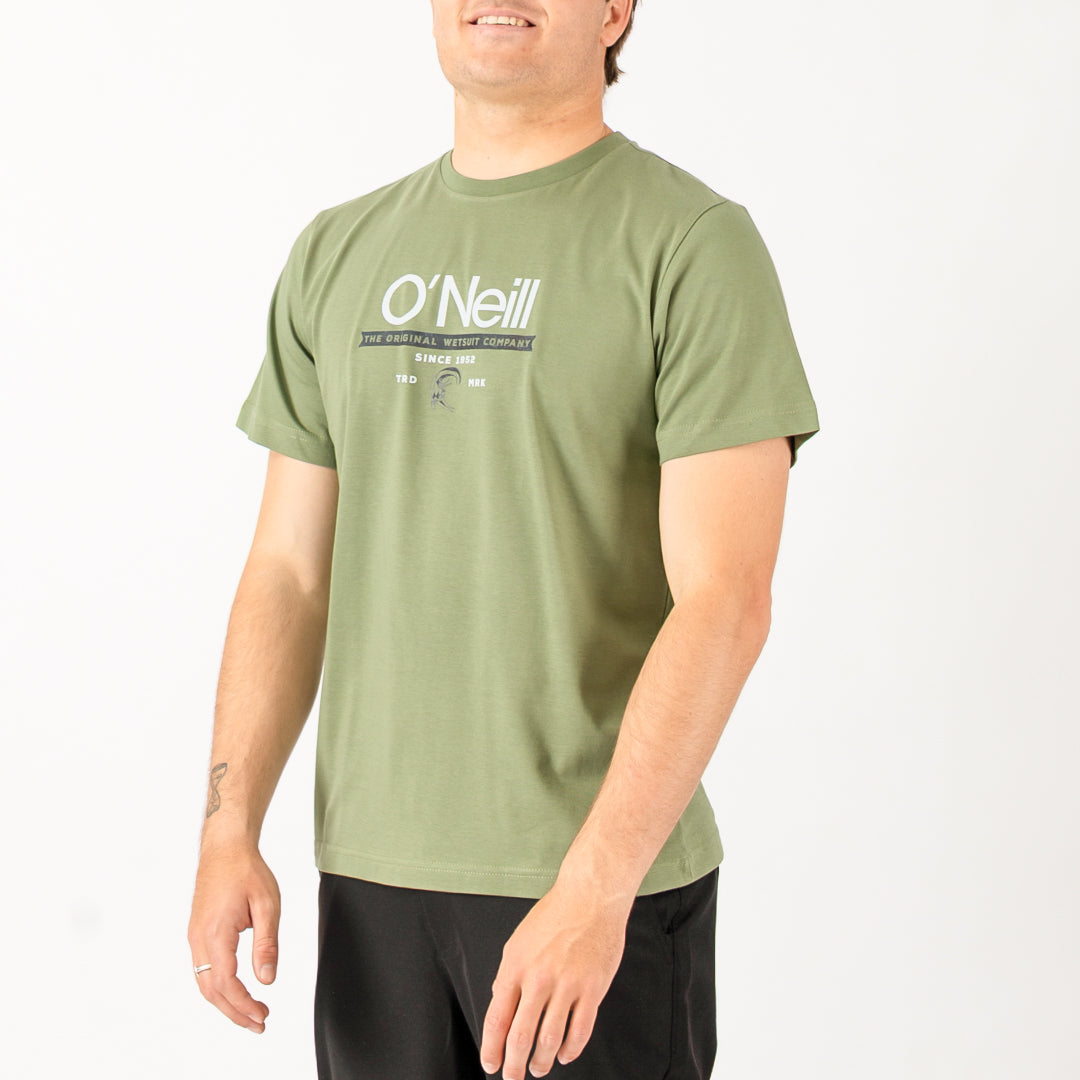 Person wearing a green O'Neill t-shirt on a white background