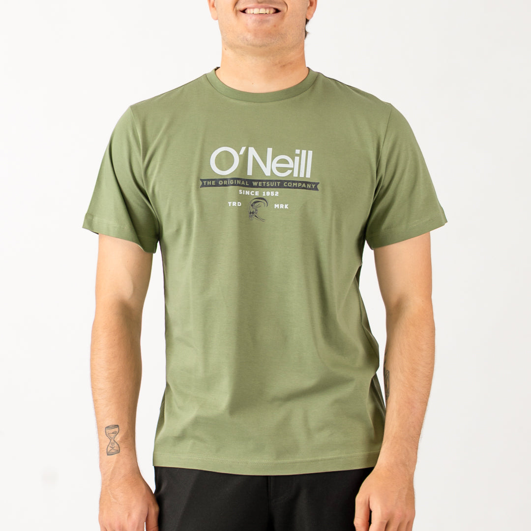 Person wearing a green O'Neill t-shirt on a white background