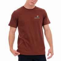 Man wearing a brown t-shirt with a logo on a white background