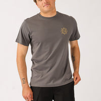 Man wearing a gray t-shirt with a logo on a white background
