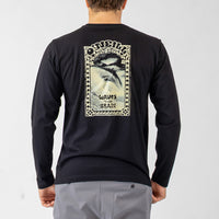 Black long-sleeve shirt with a graphic design on the back, worn by a person against a light gray background.