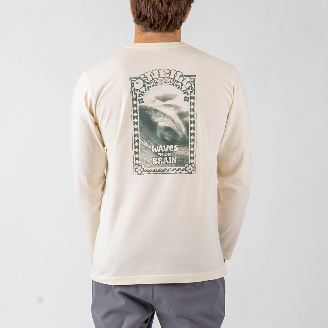 Person wearing a cream long-sleeve shirt with a graphic design on the back against a white background