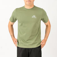 Person wearing a green t-shirt with a brand logo on a white background