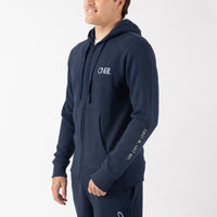 Man wearing a navy blue hoodie with 'O'Neill' branding on a light gray background