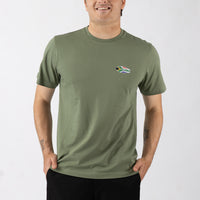 Person wearing a green t-shirt with a logo on a white background