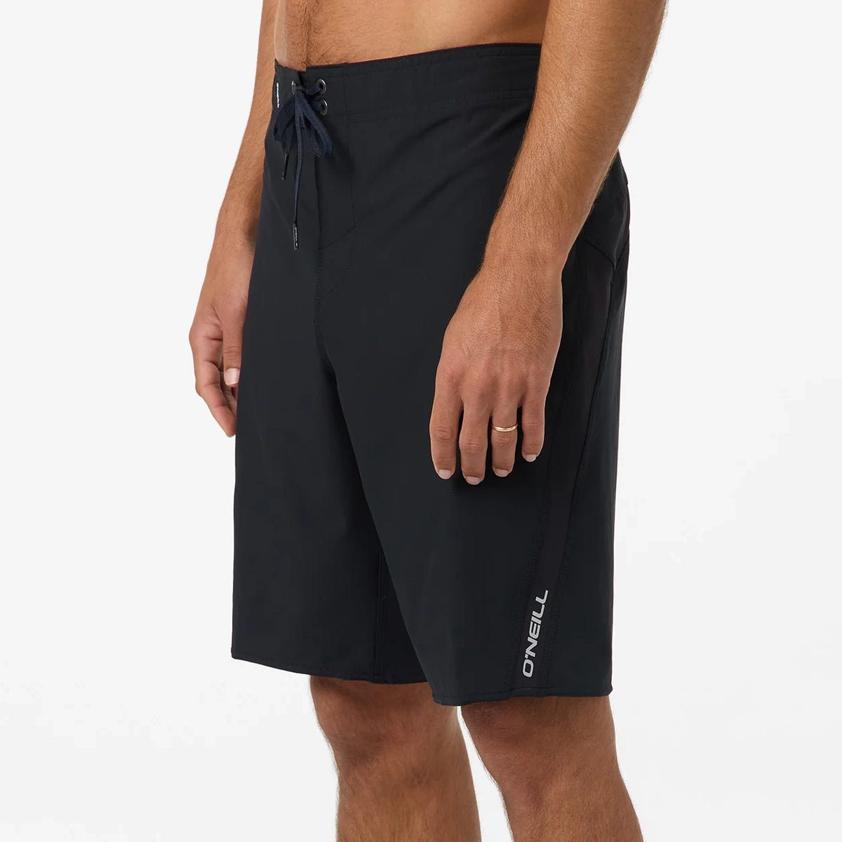 Black shorts with a brand logo on a white background