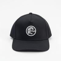 Black cap with a white logo on a light gray background