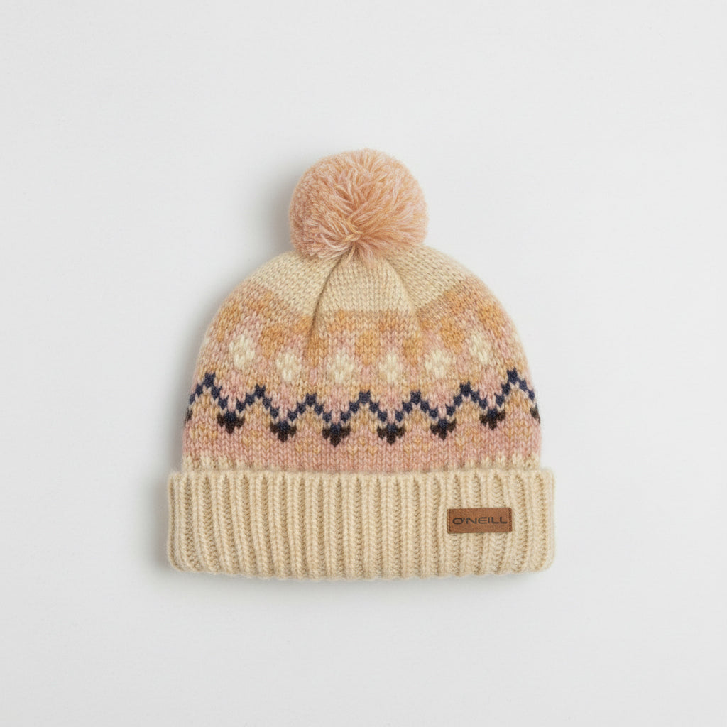 Knitted beanie with a pom-pom on a light gray background