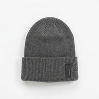 Gray knit beanie with a brand label on a white background