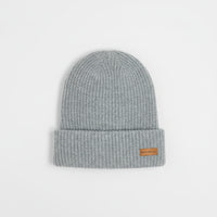 Gray knit beanie with a brand label on a light gray background