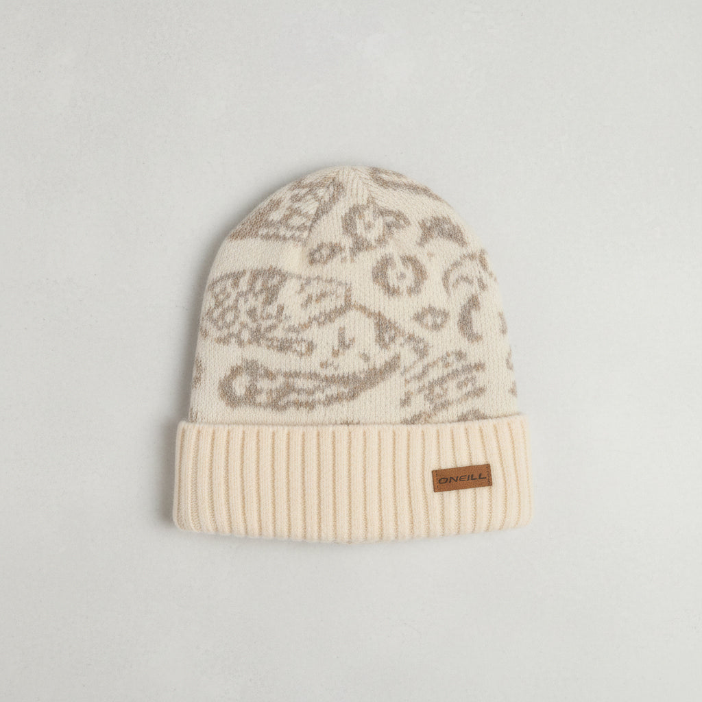 Beige knit beanie with pattern on a light gray background